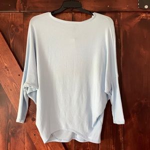 Francesca’s blue sweater